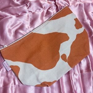 Lisa Says Gah cowprint pouch